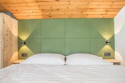 Ein Bett oder Betten in einem Zimmer der Unterkunft Haus Widmann
