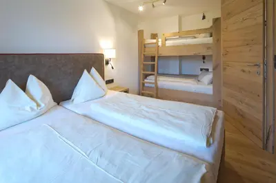 Ein Bett oder Betten in einem Zimmer der Unterkunft Appartement Haus Sonntal
