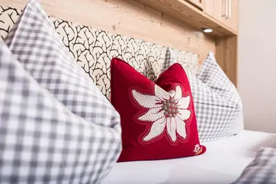 Ein Bett oder Betten in einem Zimmer der Unterkunft Bergchalet Rauchenhof