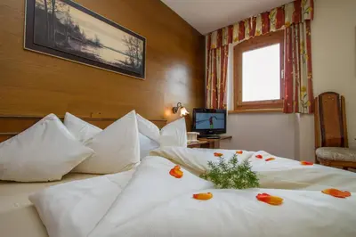 Ein Bett oder Betten in einem Zimmer der Unterkunft Hotel Metzgerwirt