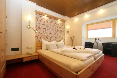 Ein Bett oder Betten in einem Zimmer der Unterkunft Hotel Metzgerwirt