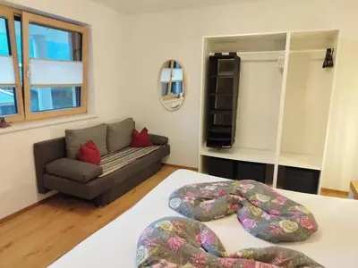 Ein Bett oder Betten in einem Zimmer der Unterkunft Apartment Klein & Fein