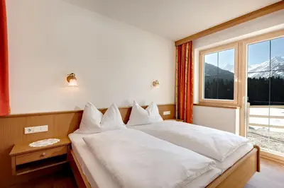 Ein Bett oder Betten in einem Zimmer der Unterkunft Appartements Luegeck
