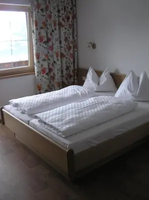 Ein Bett oder Betten in einem Zimmer der Unterkunft Appartements Luegeck