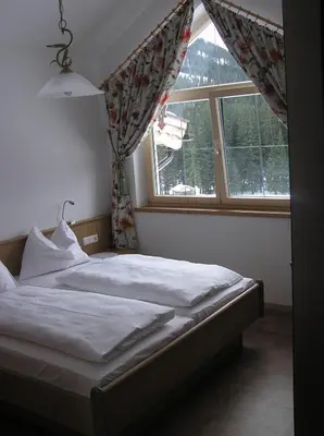 Ein Bett oder Betten in einem Zimmer der Unterkunft Appartements Luegeck