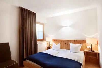 Ein Bett oder Betten in einem Zimmer der Unterkunft DieAussicht - Refugium am Berg