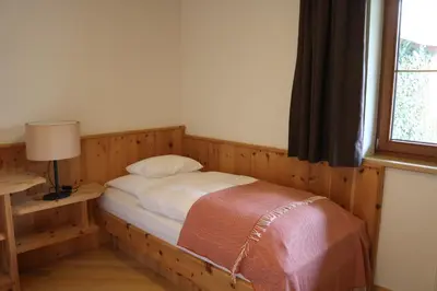 Ein Bett oder Betten in einem Zimmer der Unterkunft DieAussicht - Refugium am Berg