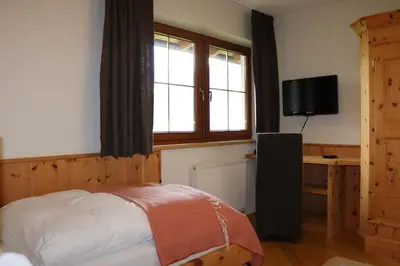 Ein Bett oder Betten in einem Zimmer der Unterkunft DieAussicht - Refugium am Berg