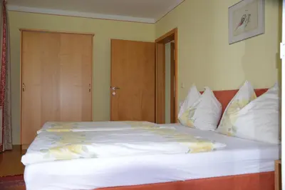 Ein Bett oder Betten in einem Zimmer der Unterkunft Haus Dorothea