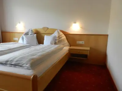 Ein Bett oder Betten in einem Zimmer der Unterkunft Grieswirt