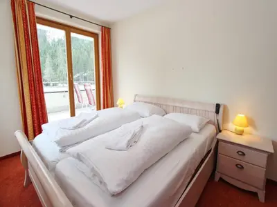 Ein Bett oder Betten in einem Zimmer der Unterkunft Detached Chalet in Saalbach