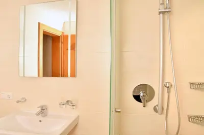 Ein Badezimmer in der Unterkunft Appartements neben der Gondelbahn - Haus Süd
