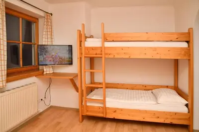 Ein Bett oder Betten in einem Zimmer der Unterkunft Appartements neben der Gondelbahn - Haus Süd