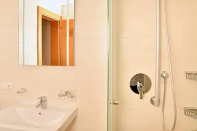 Ein Badezimmer in der Unterkunft Appartements neben der Gondelbahn - Haus Süd
