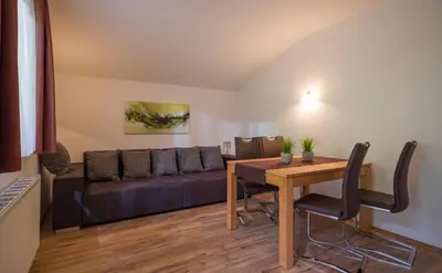 Ein Sitzbereich in der Unterkunft Appartement Hollaus
