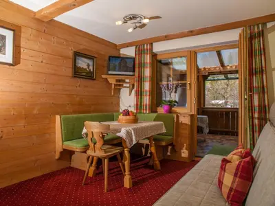 Ein Sitzbereich in der Unterkunft Appartements Stadlerhof