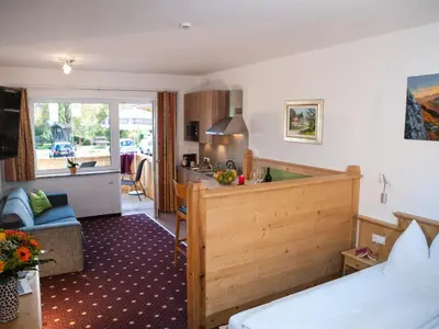 Ein Bett oder Betten in einem Zimmer der Unterkunft Appartements Stadlerhof