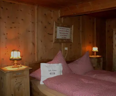 Ein Bett oder Betten in einem Zimmer der Unterkunft Bauernhaus Tummenerhof