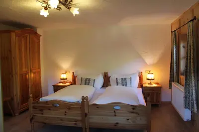 Ein Bett oder Betten in einem Zimmer der Unterkunft Bauernhaus Tummenerhof