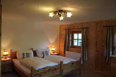 Ein Bett oder Betten in einem Zimmer der Unterkunft Bauernhaus Tummenerhof