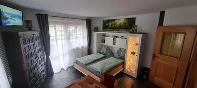 Ein Bett oder Betten in einem Zimmer der Unterkunft Koasablick