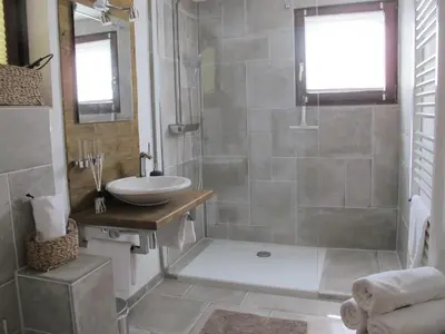 Ein Badezimmer in der Unterkunft Chalet Tirolia