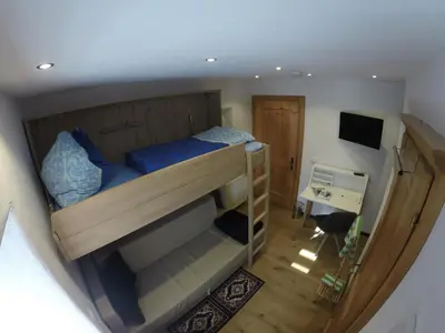 Ein Bett oder Betten in einem Zimmer der Unterkunft Hoamatl