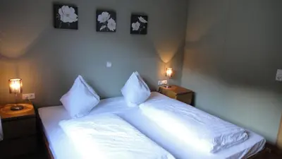 Ein Bett oder Betten in einem Zimmer der Unterkunft Apartment Kitzbichler by Apartment Managers