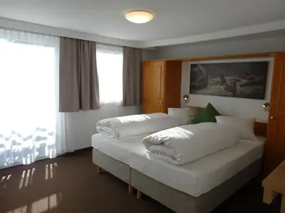 Ein Bett oder Betten in einem Zimmer der Unterkunft Bhome Gästehaus b&b / Apartments