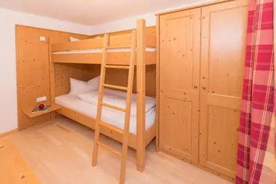 Ein Bett oder Betten in einem Zimmer der Unterkunft Das kleine, feine SONNWEND