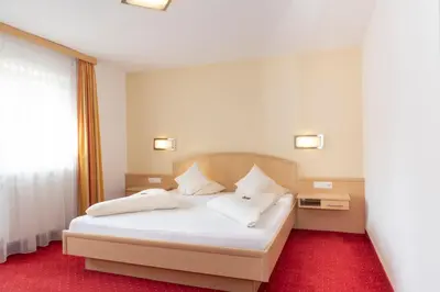 Ein Bett oder Betten in einem Zimmer der Unterkunft Sun Valley - Wildschönau