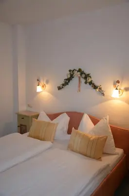 Ein Bett oder Betten in einem Zimmer der Unterkunft Apartment Grattschlössl