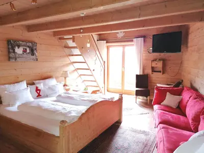 Ein Bett oder Betten in einem Zimmer der Unterkunft Rosis Sonnbergstuben