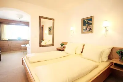 Ein Bett oder Betten in einem Zimmer der Unterkunft Rosis Sonnbergstuben