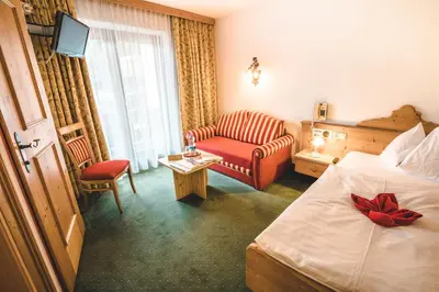 Ein Bett oder Betten in einem Zimmer der Unterkunft Hotel Metzgerwirt