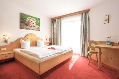 Ein Bett oder Betten in einem Zimmer der Unterkunft Hotel Metzgerwirt