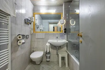Ein Badezimmer in der Unterkunft Garni Das SONNALP