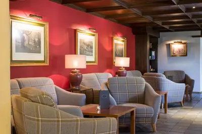 Ein Sitzbereich in der Unterkunft Sporthotel Austria