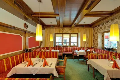 Ein Restaurant oder anderes Speiselokal in der Unterkunft Pension Koch