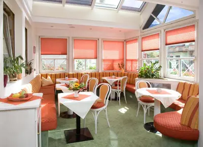 Ein Restaurant oder anderes Speiselokal in der Unterkunft Pension Koch