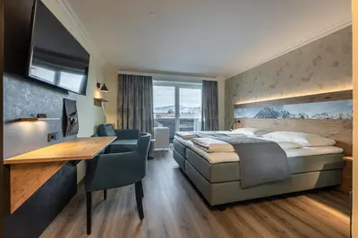 Ein Bett oder Betten in einem Zimmer der Unterkunft Hotel Fischer