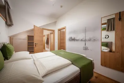 Ein Bett oder Betten in einem Zimmer der Unterkunft Hotel Fischer