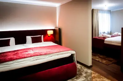 Ein Bett oder Betten in einem Zimmer der Unterkunft Hotel Jakobwirt Westendorf