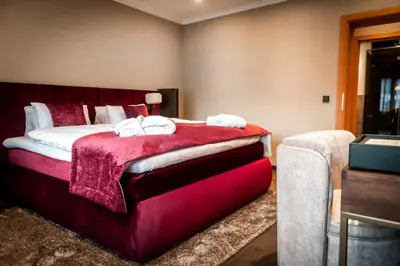 Ein Bett oder Betten in einem Zimmer der Unterkunft Hotel Jakobwirt Westendorf