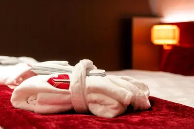 Ein Bett oder Betten in einem Zimmer der Unterkunft Hotel Jakobwirt Westendorf