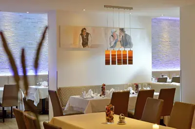 Ein Restaurant oder anderes Speiselokal in der Unterkunft Wohlfühlhotel Schiestl