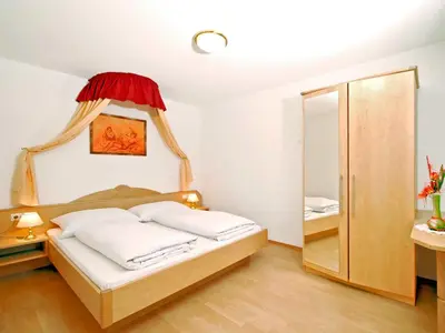 Ein Bett oder Betten in einem Zimmer der Unterkunft Apartment Sonnenau