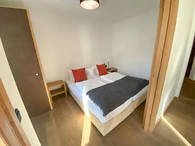Ein Bett oder Betten in einem Zimmer der Unterkunft Suiten Am Schloss