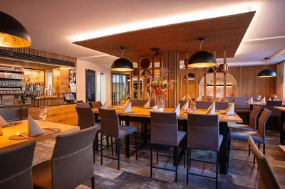 Ein Sitzbereich in der Unterkunft Hotel Mesnerwirt - Bergblick & Tiroler Küche