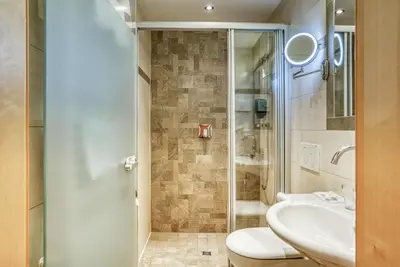 Ein Badezimmer in der Unterkunft SonnenHOF hotel gerlos centrum
